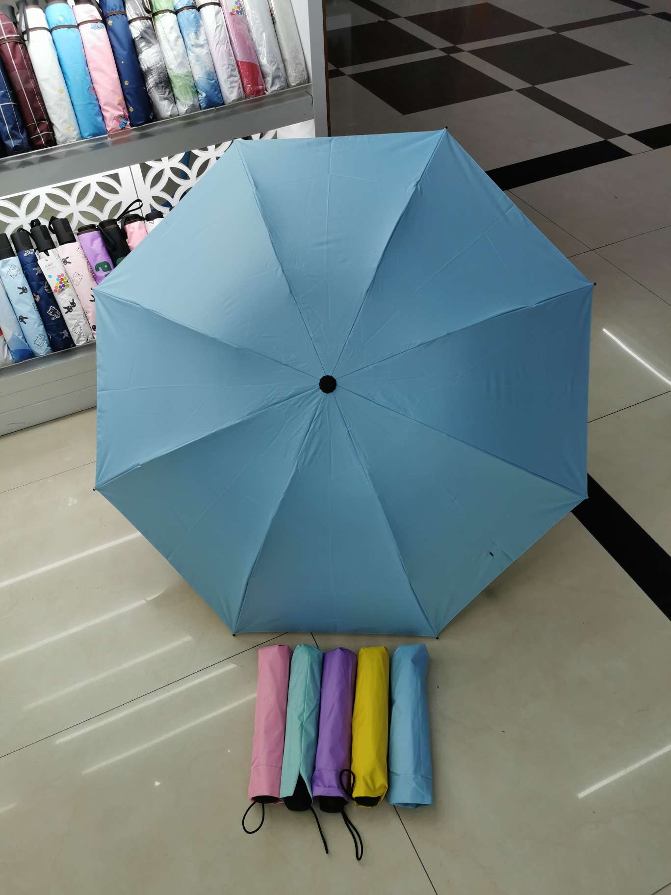 Factory direct sales of black rubber umbrellas, all-weather umbrellas, advertising umbrellas, and logos can be printed Application Scenario