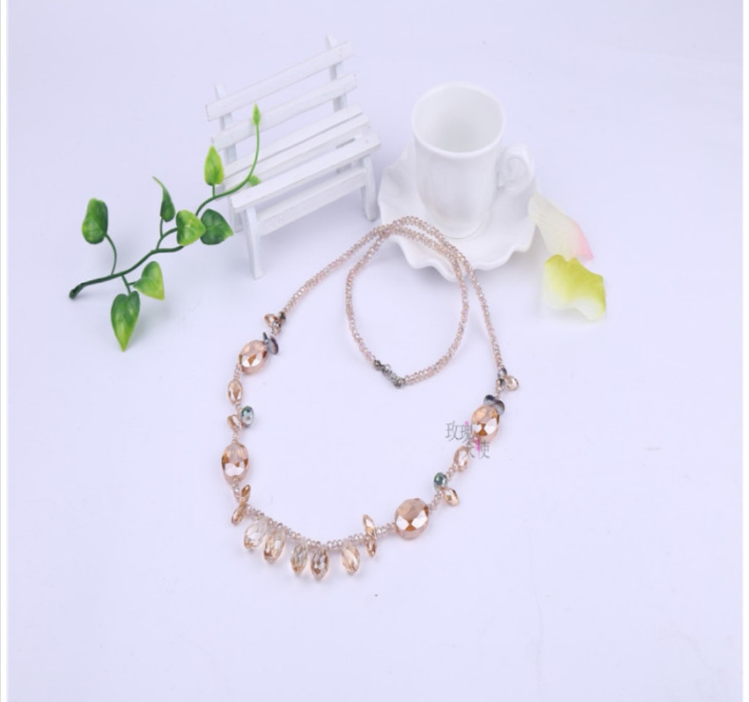 Rose Angel Classic handcrafted crystal beaded long versatile sweater chain water drop Necklace, a best-selling women's accessory Item Picture