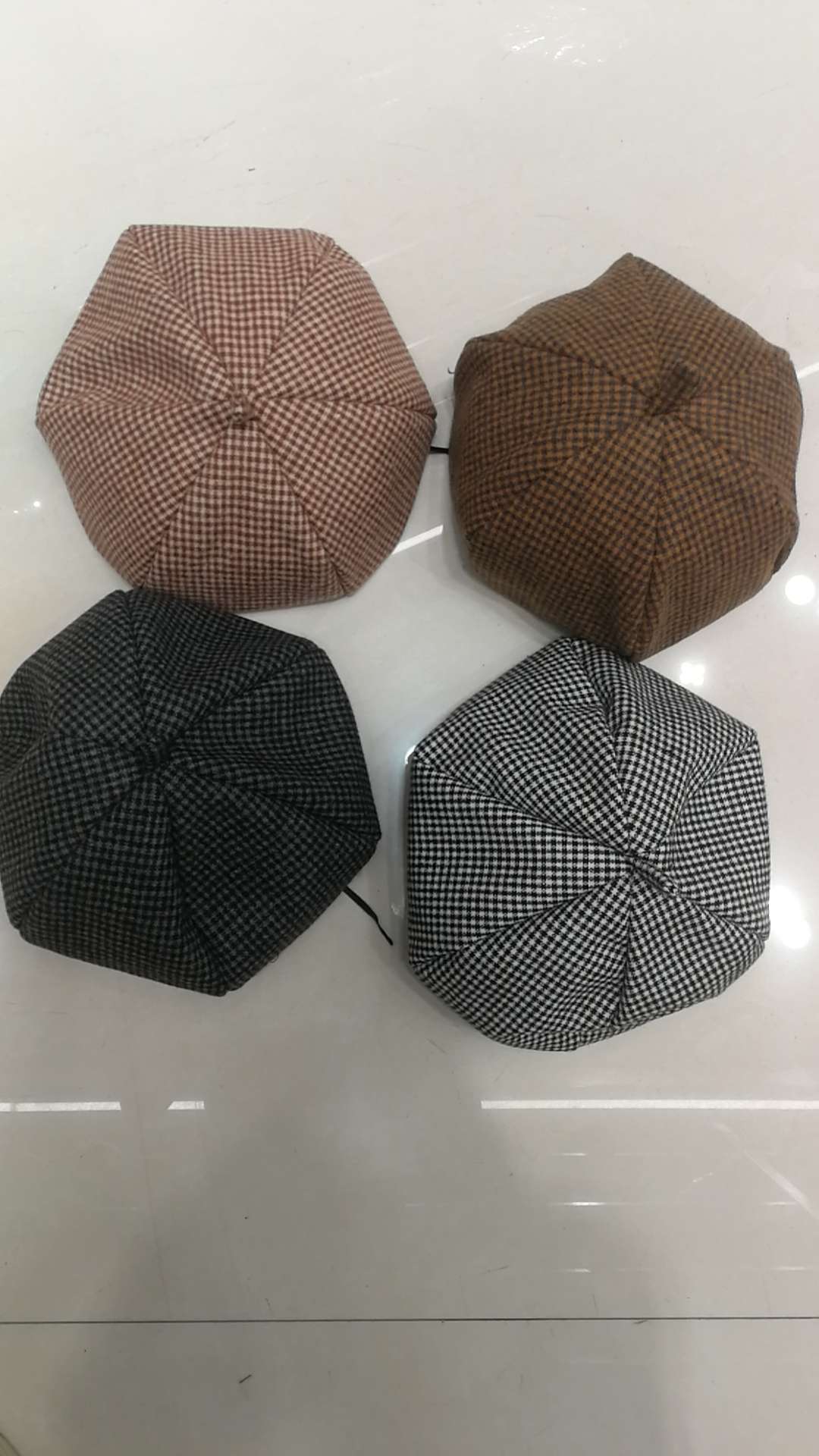 A six-corner cap with a checkered pattern