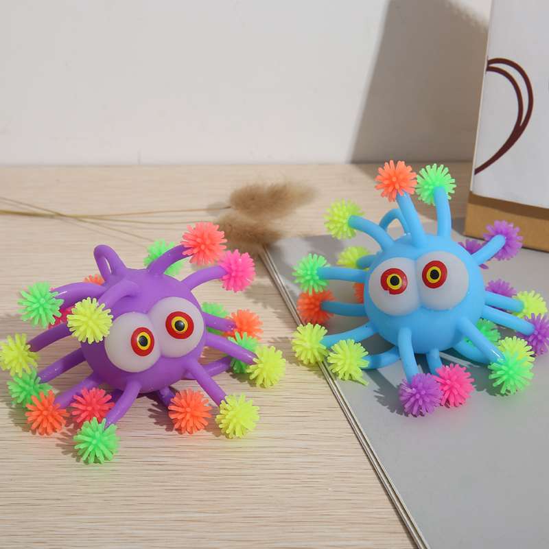 凸眼雪花球毛毛球软胶球亮灯毛毛球白底实物图