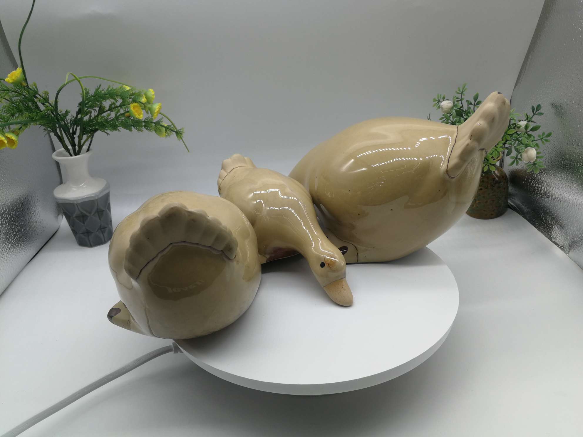 Three water playing duck figurines are available in white, green or blue details Picture