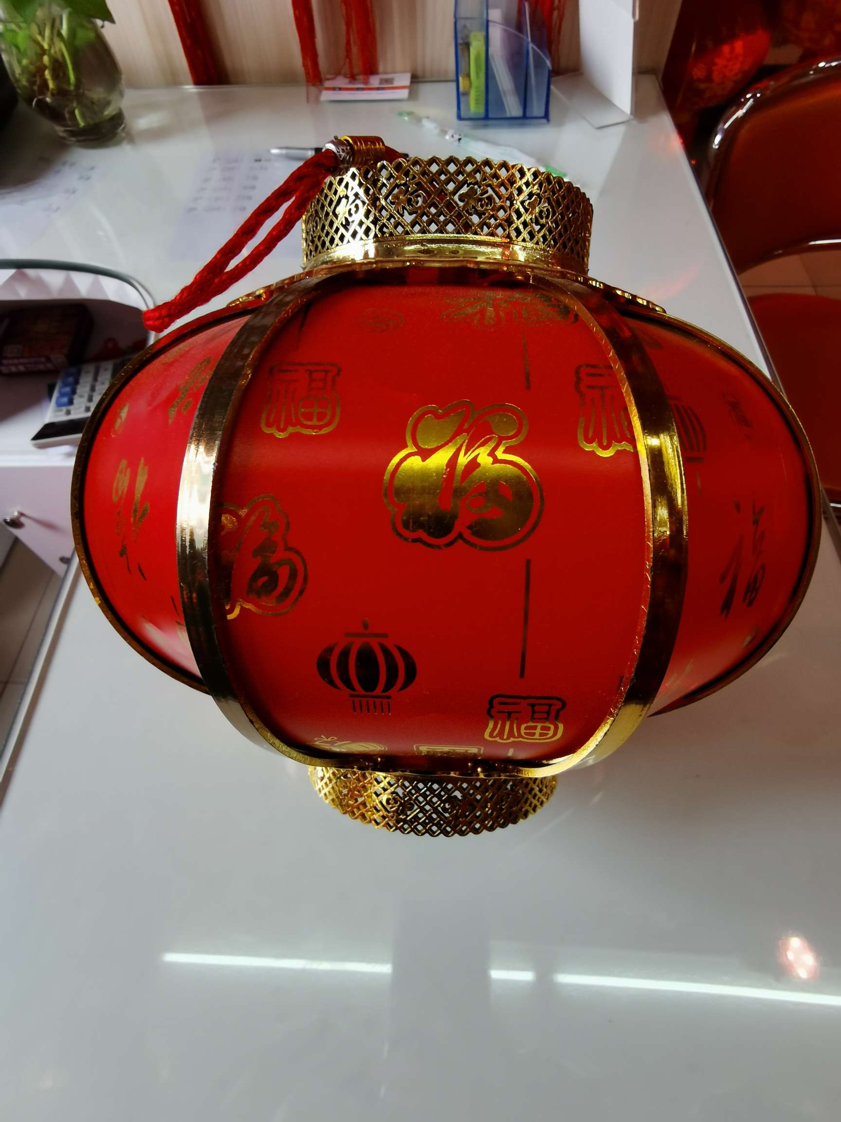A 30-centimeter golden antique lantern