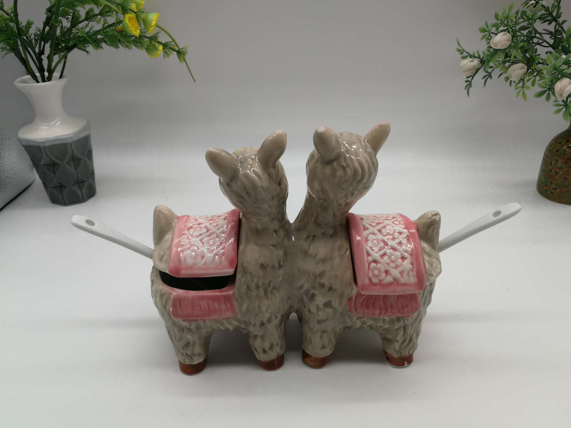 A family of little lambs in a ceramic jar Item Picture