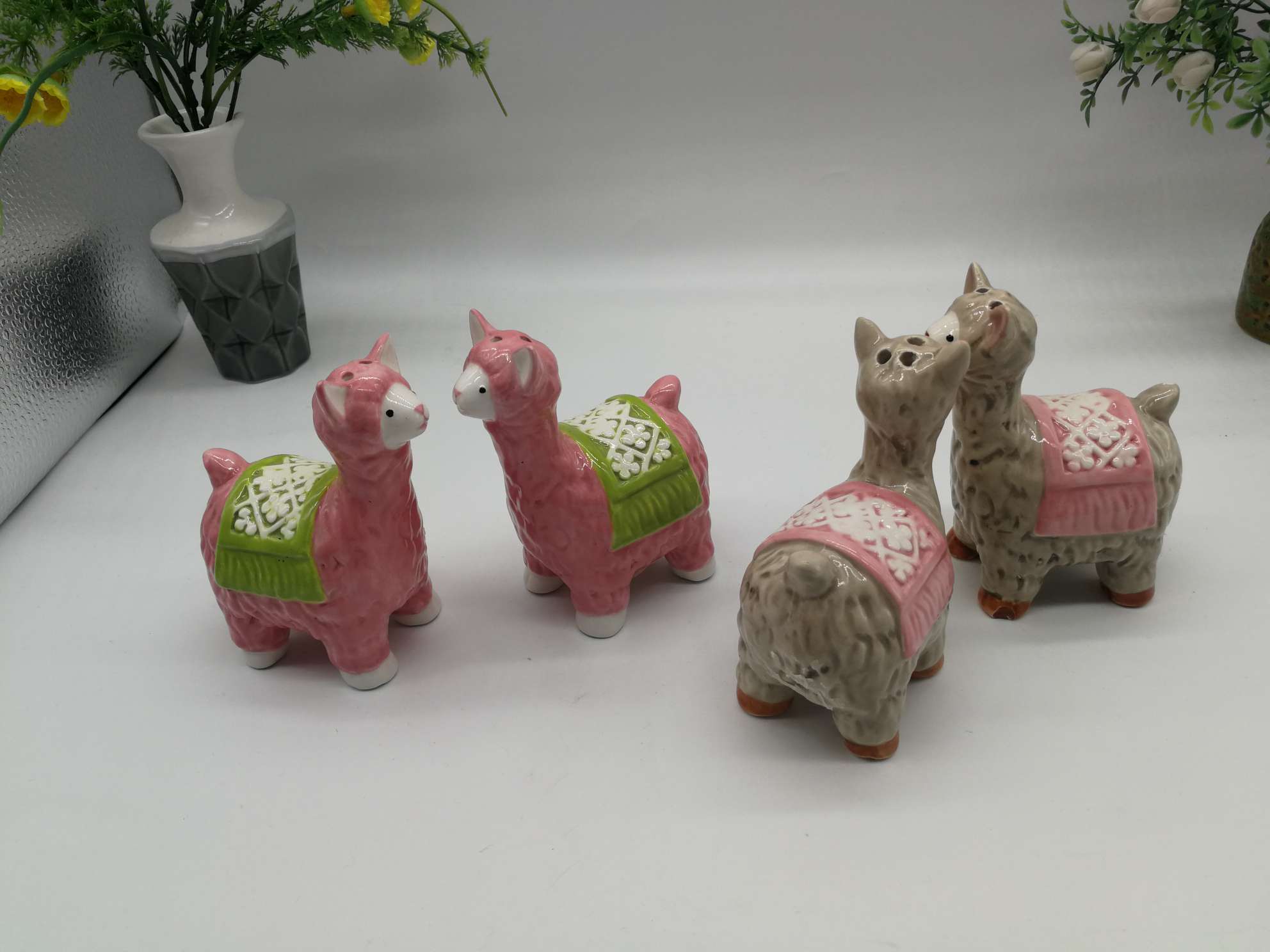 A family of little lambs in a ceramic jar undefined