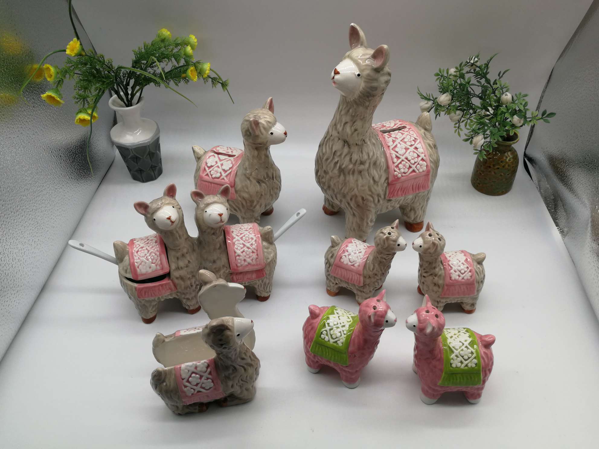 A family of little lambs in a ceramic jar