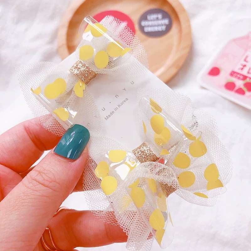 Korean candy-colored polka dot PVC bow lace children's and baby duckbill hair tie headwear details Picture
