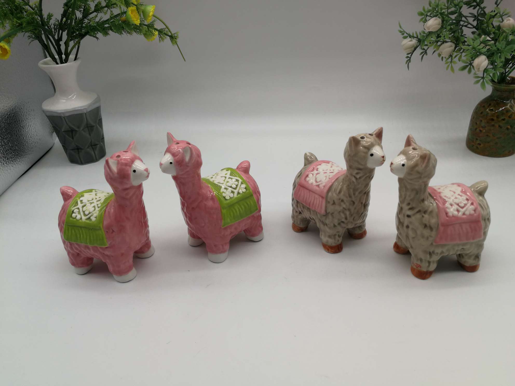 A family of little lambs in a ceramic jar undefined