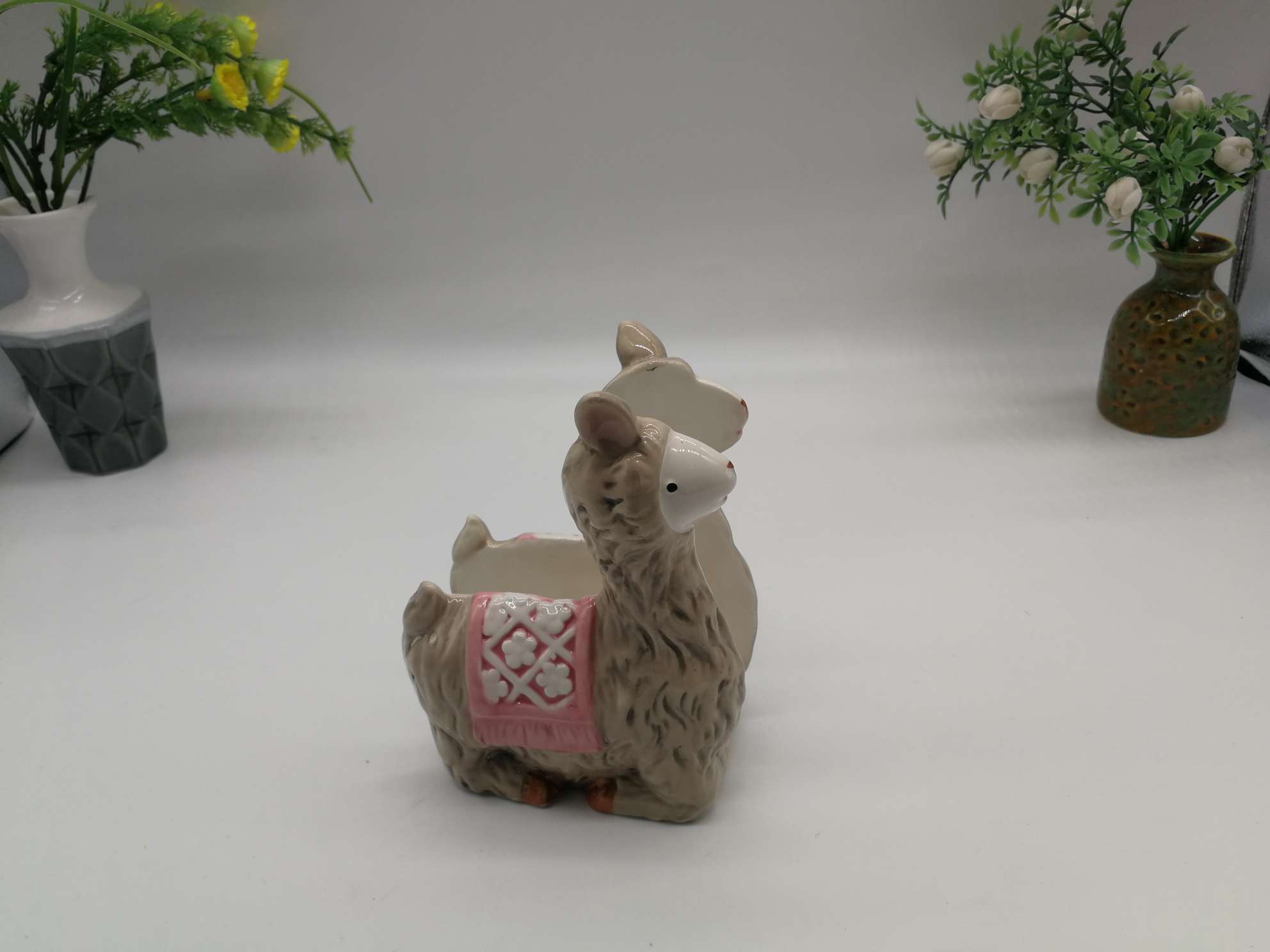 A family of little lambs in a ceramic jar Specification image