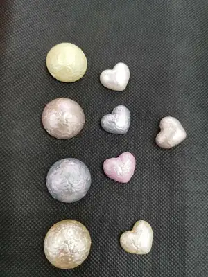 Snowflake beads in various sizes and colors thumbnail