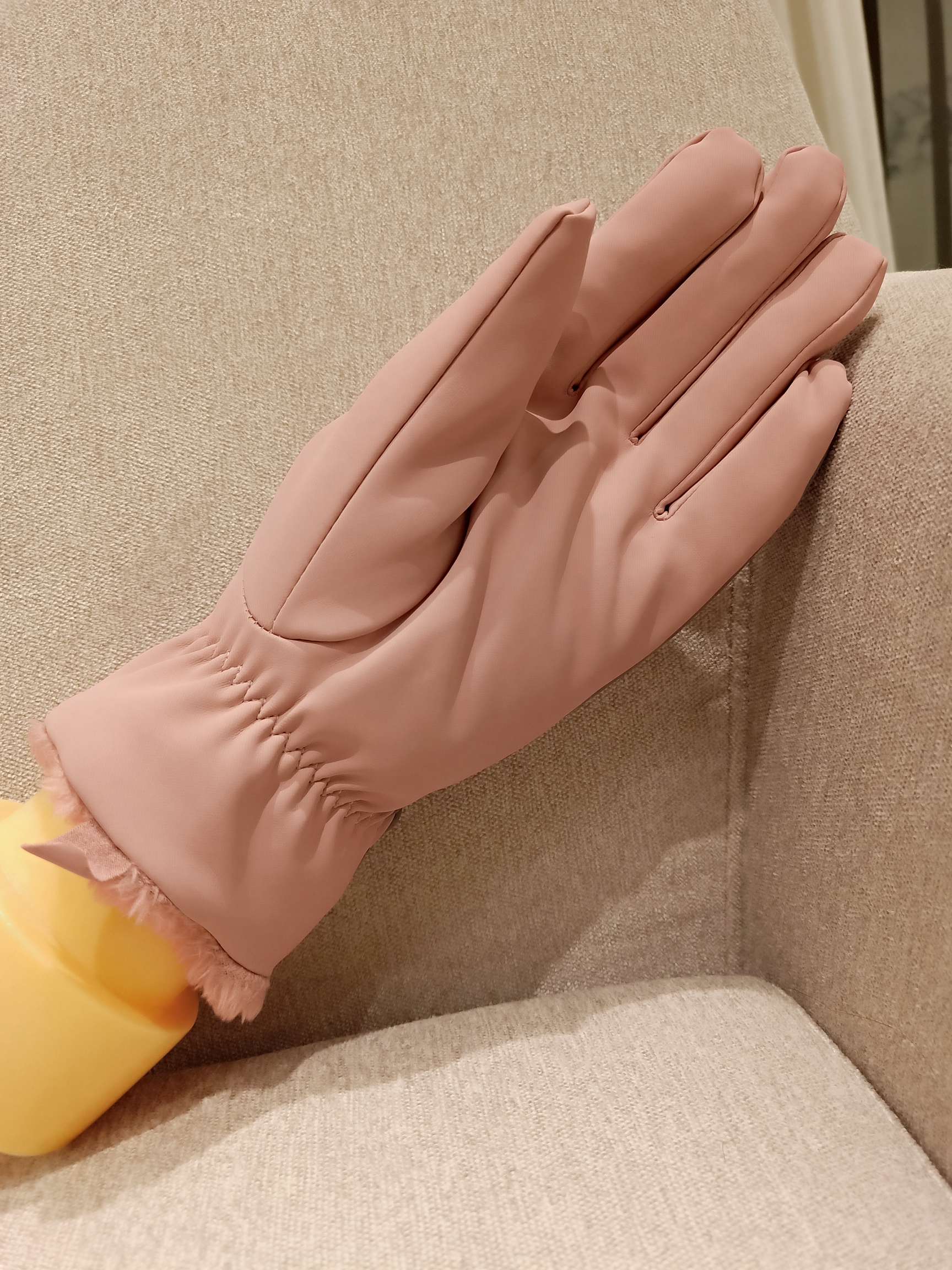 Close-up of sensitive skin gloves showing ultra-thin, flexible material
