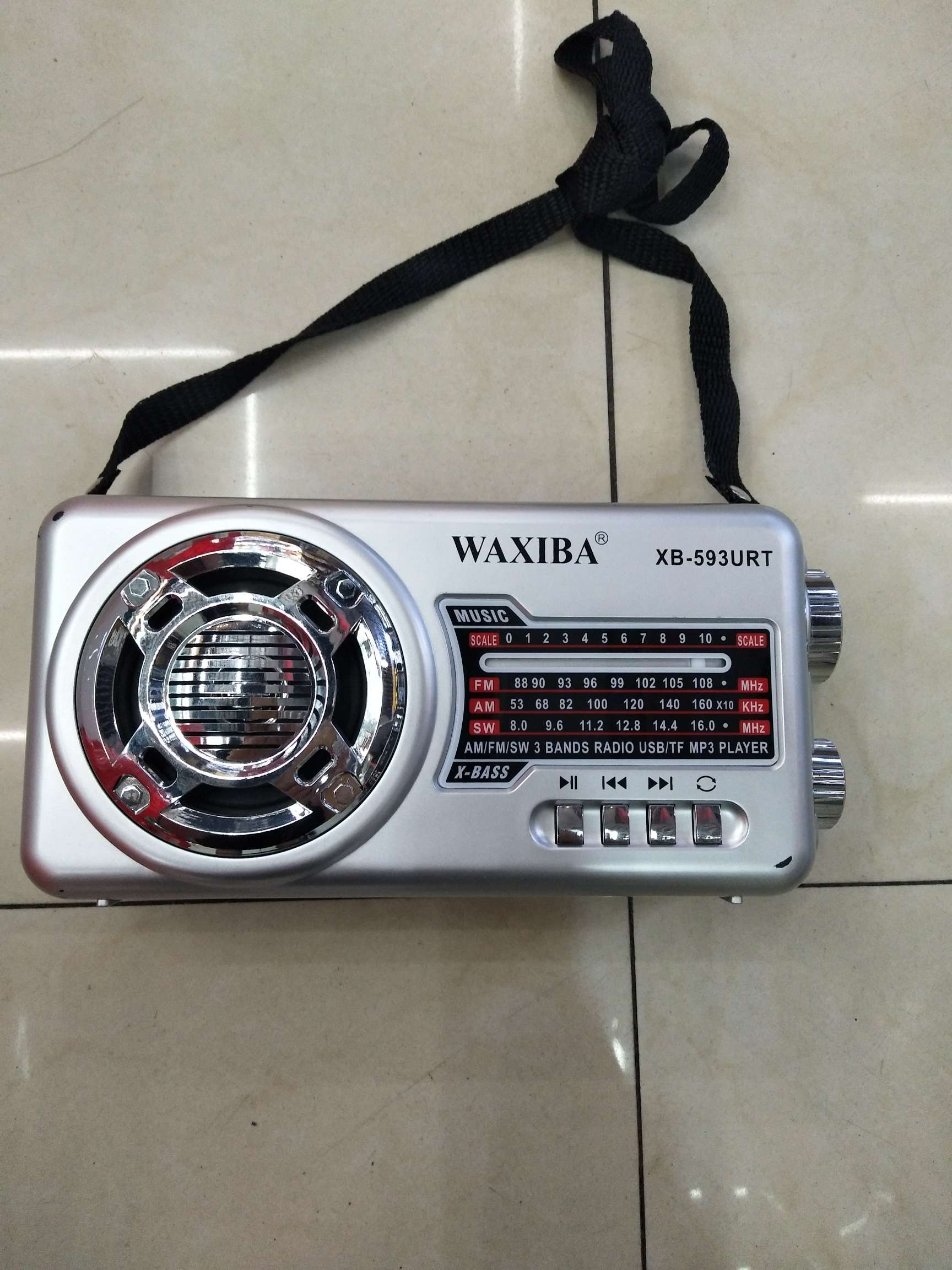 XB593URT multi-band radio with charging and card insertion