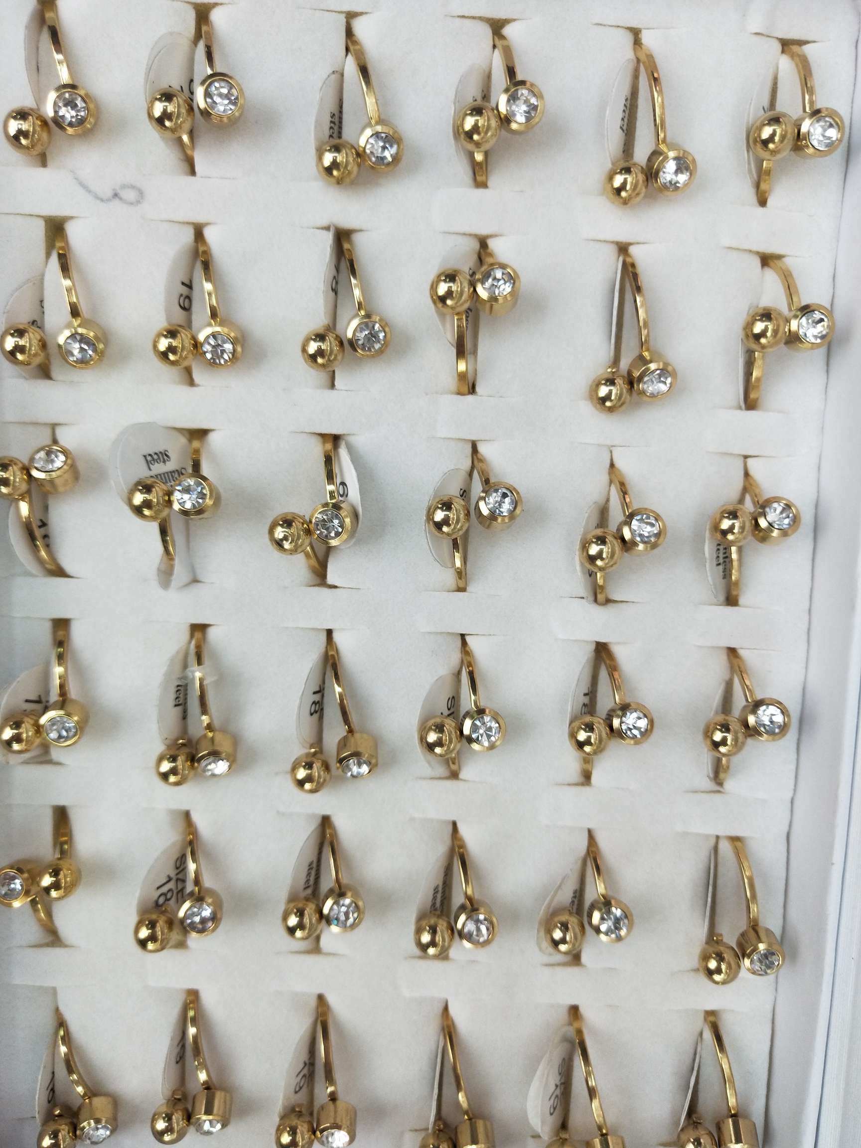 Round beads and diamond cup rings