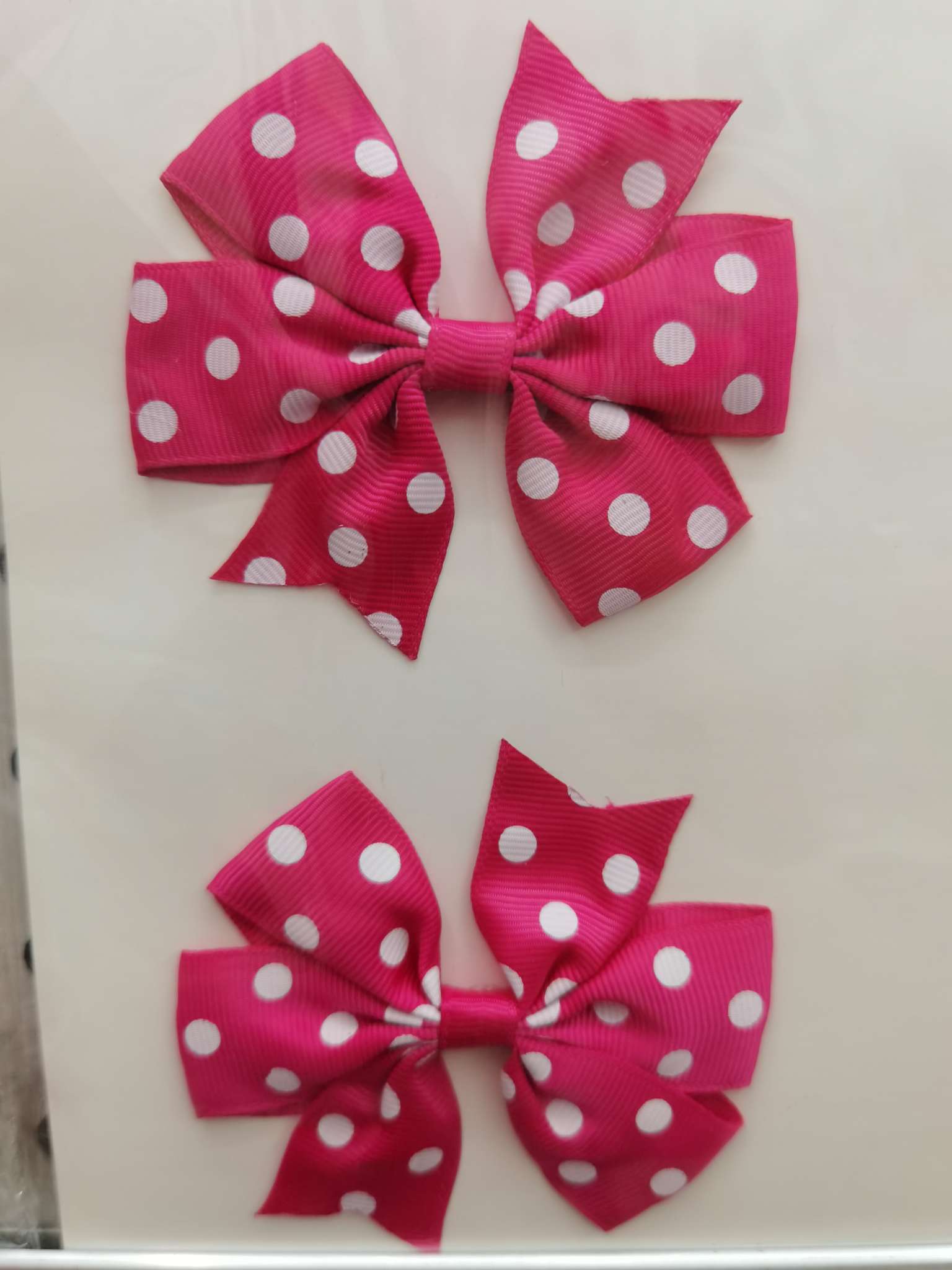 Wrap the dots of the bow around your hand