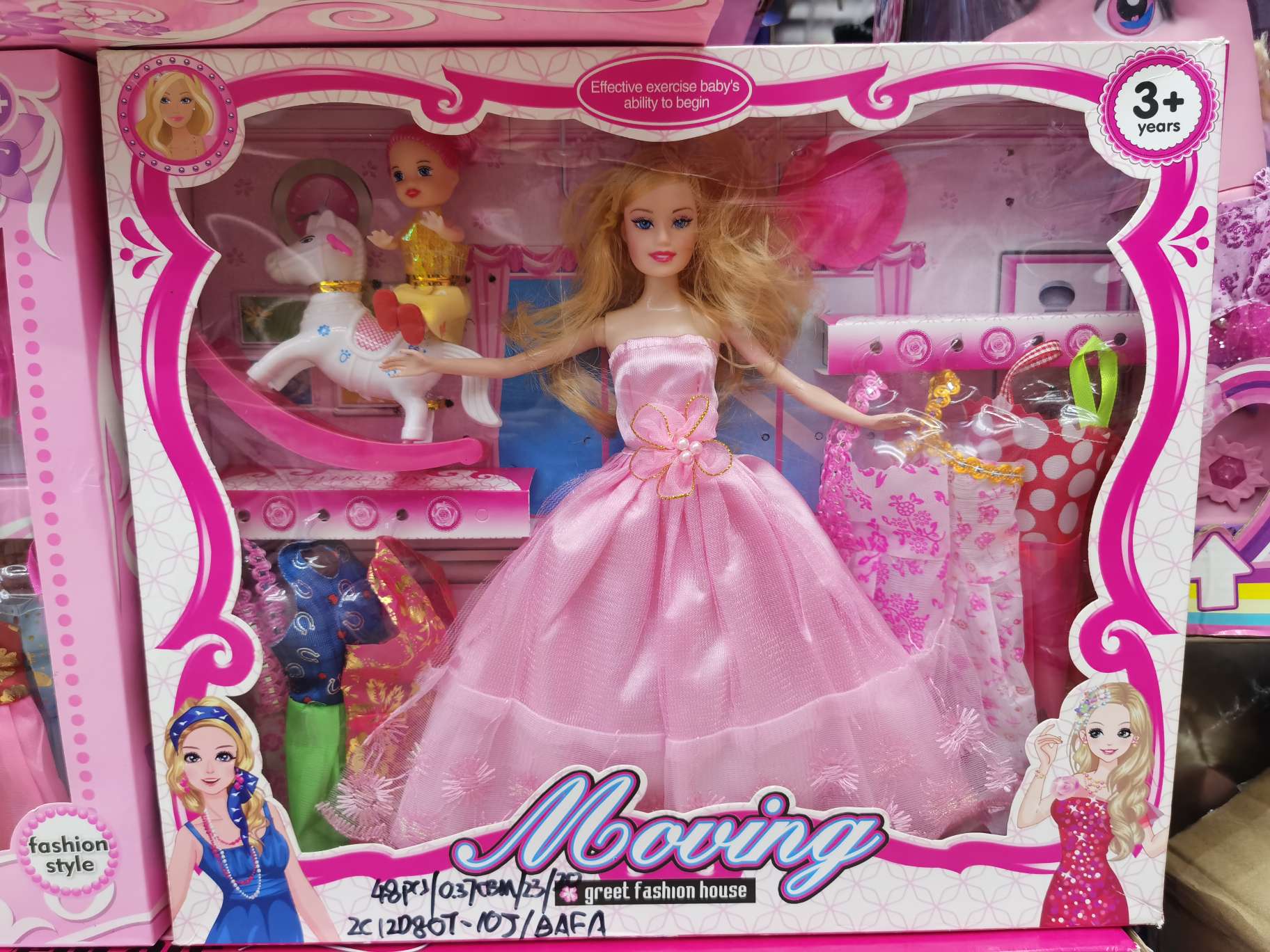 A box of Barbie dolls