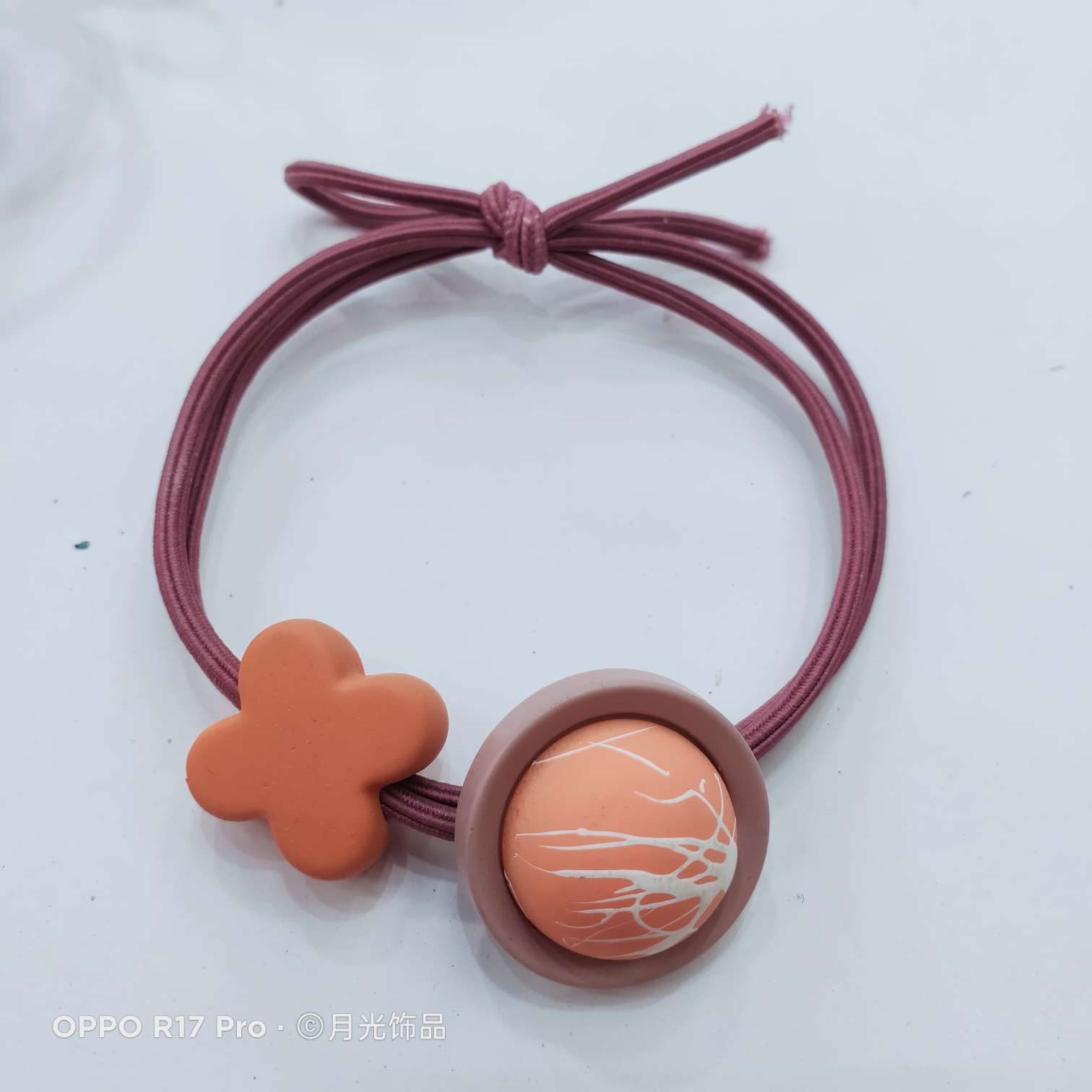 Korean-style trendy brushed button, four-leaf clover, rubber effect, knotted leather band, hair band and leather case