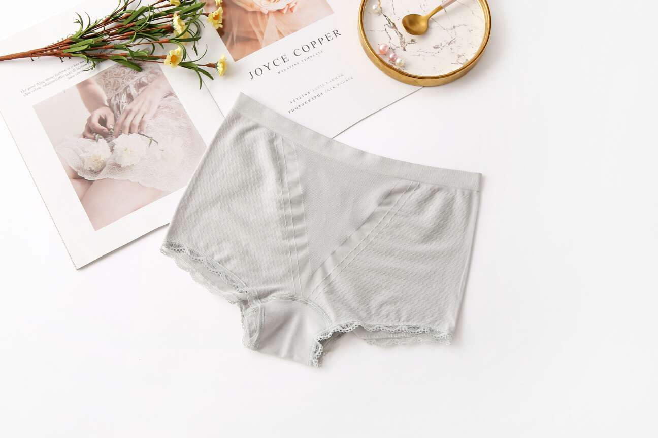 Naked ammonia V-shaped tight-tummy women's seamless underwear, mid-waist hip-lifting flat-angle women's high-elastic triangular underwear details Picture