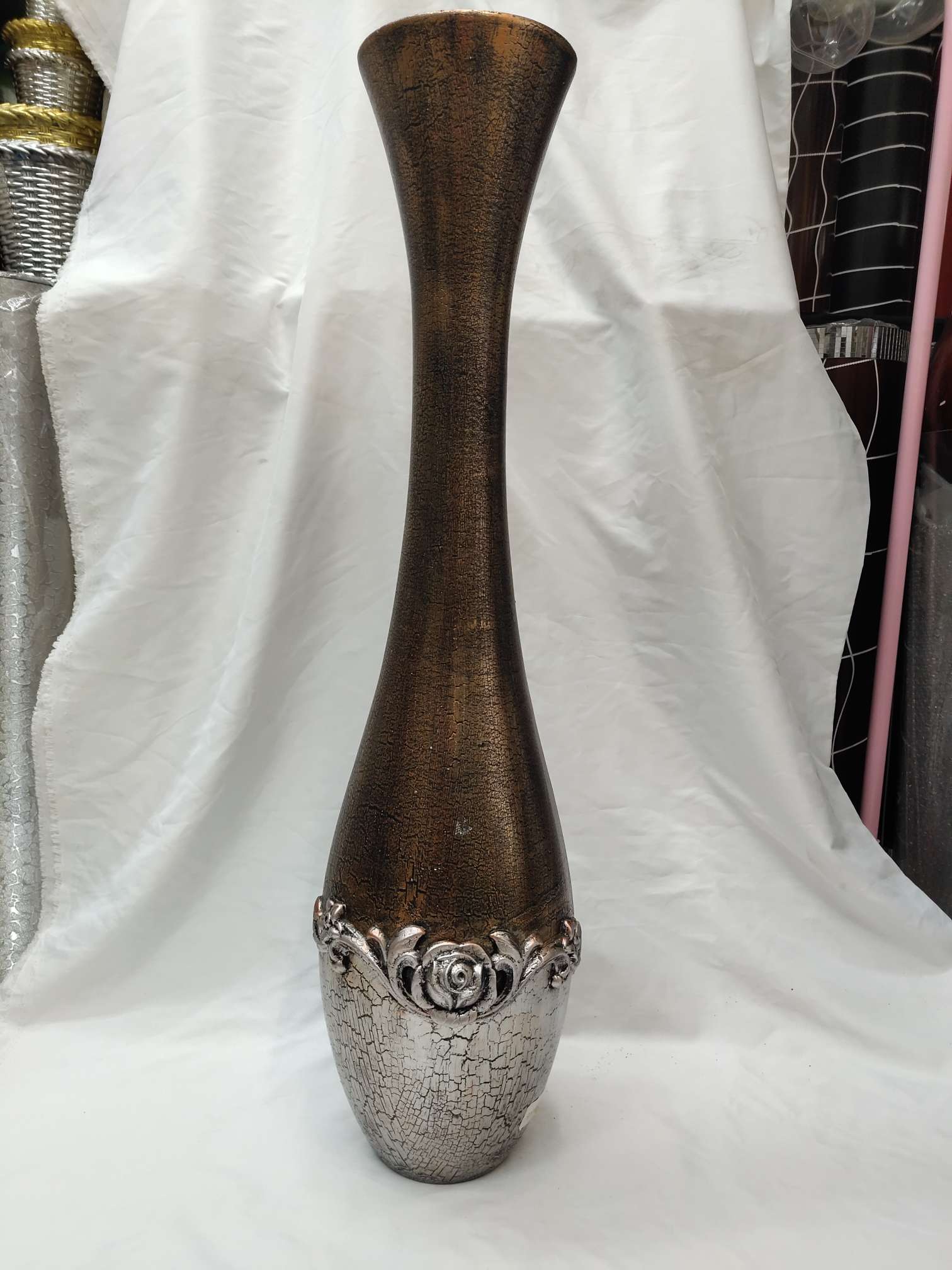 A large floor-standing vase made of density board