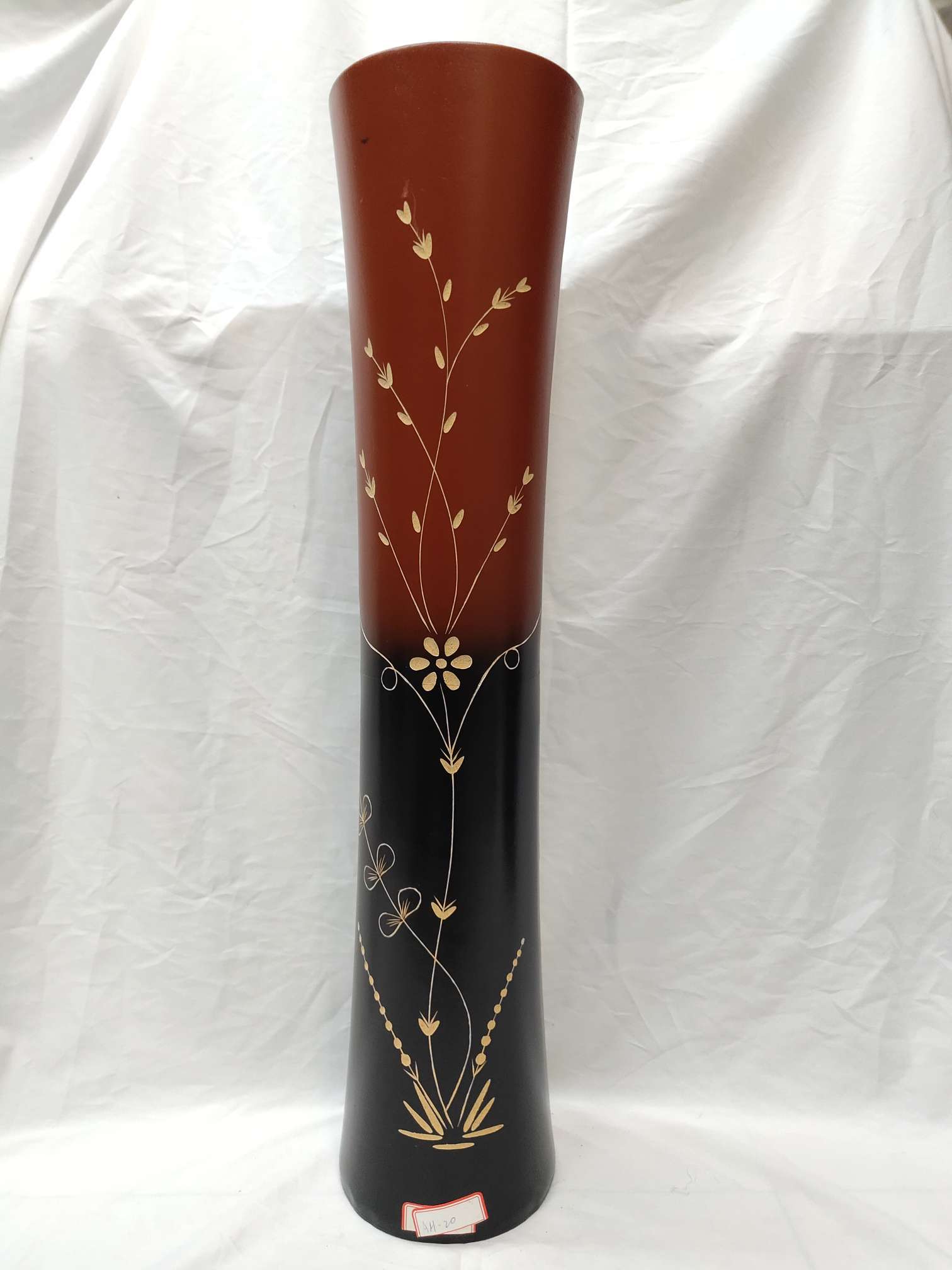 A large hand-carved floor-standing vase