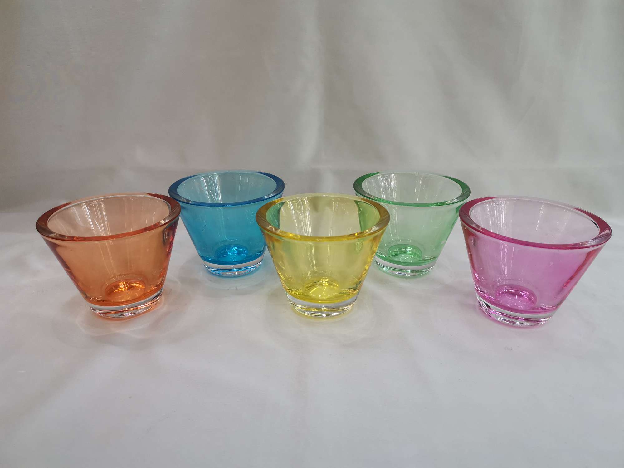 Trapezoidal colored glass candlestick