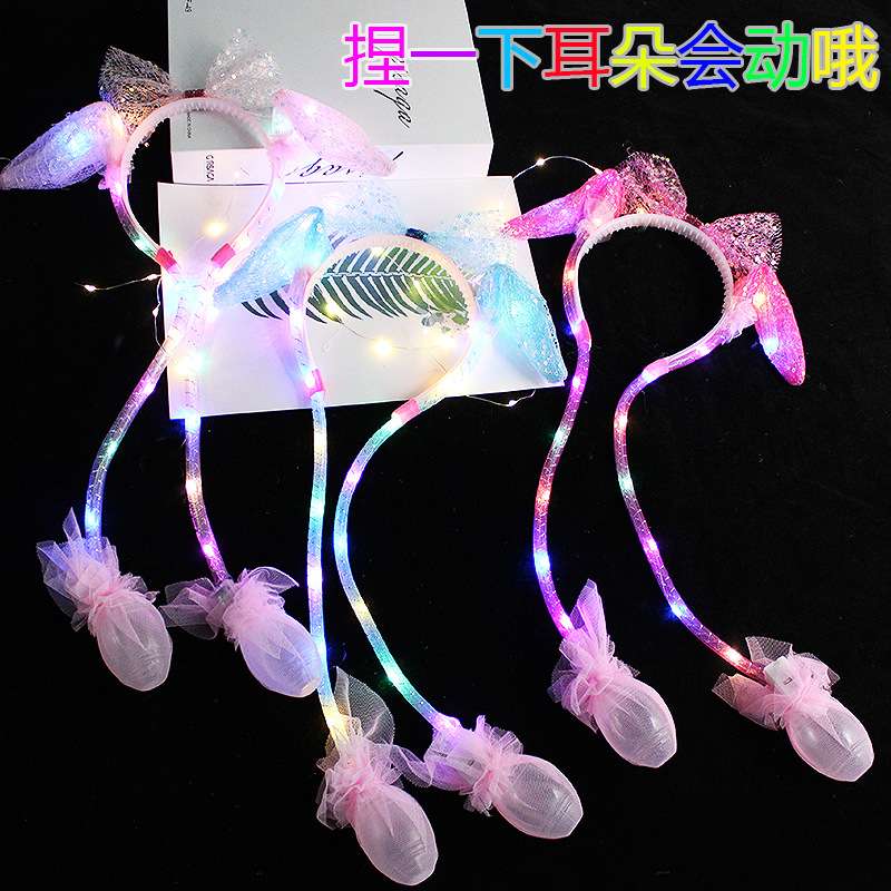 The New Year's heart-shaped hair band with luminous lights, the popular rabbit ears, will move and make sounds when pinched. The same style of sequined mesh new hair accessory undefined