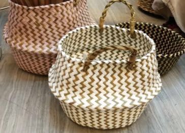 The middle diameter of the large-bellied basket is 23. It is a woven product, a flower basket made of straw
