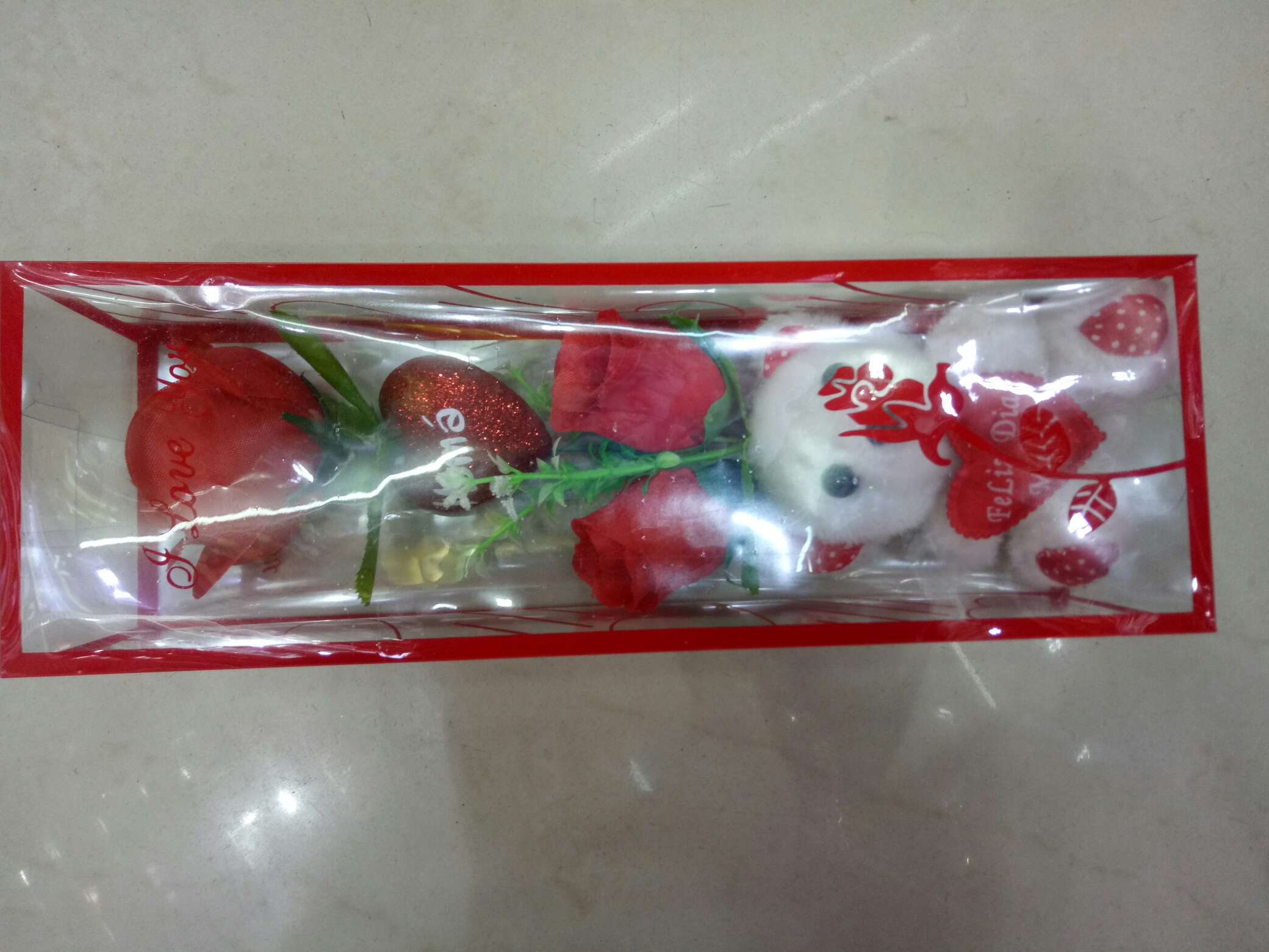 Stuffed bear presents flowers thumbnail