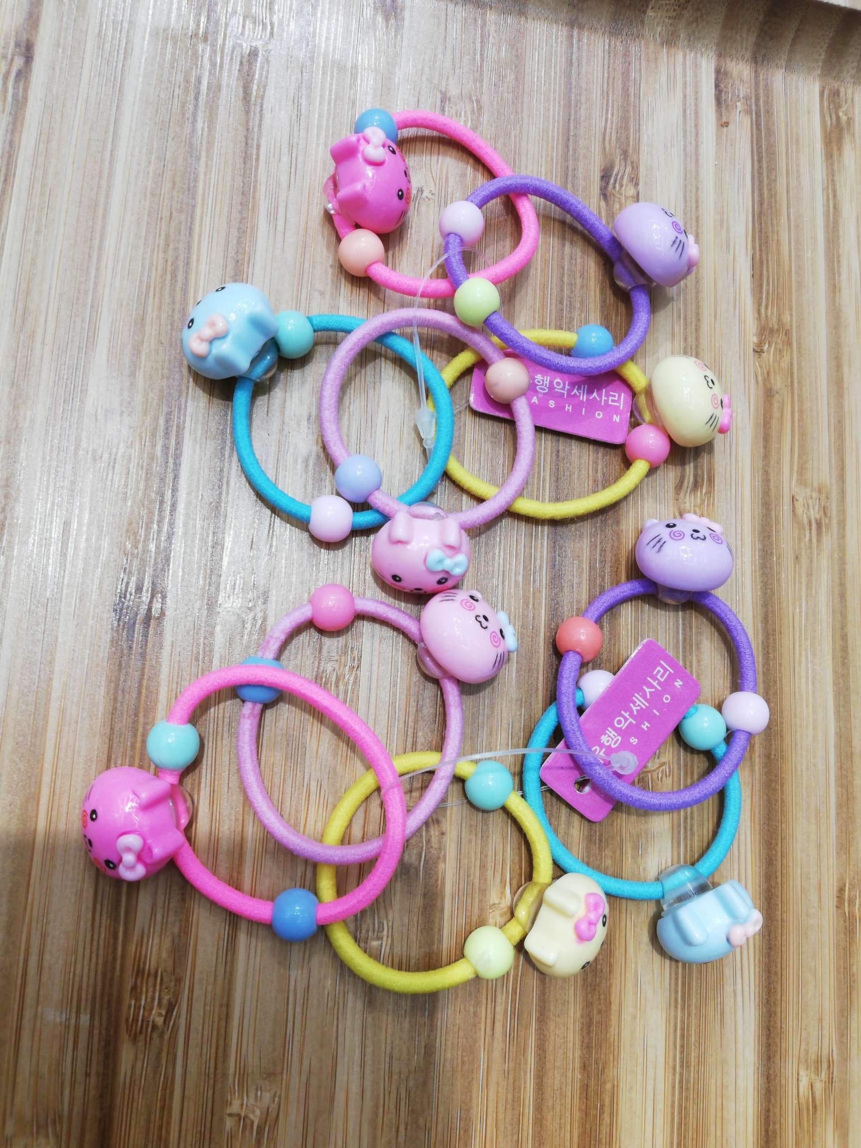 Two bead cat head nylon string rubber band thumbnail
