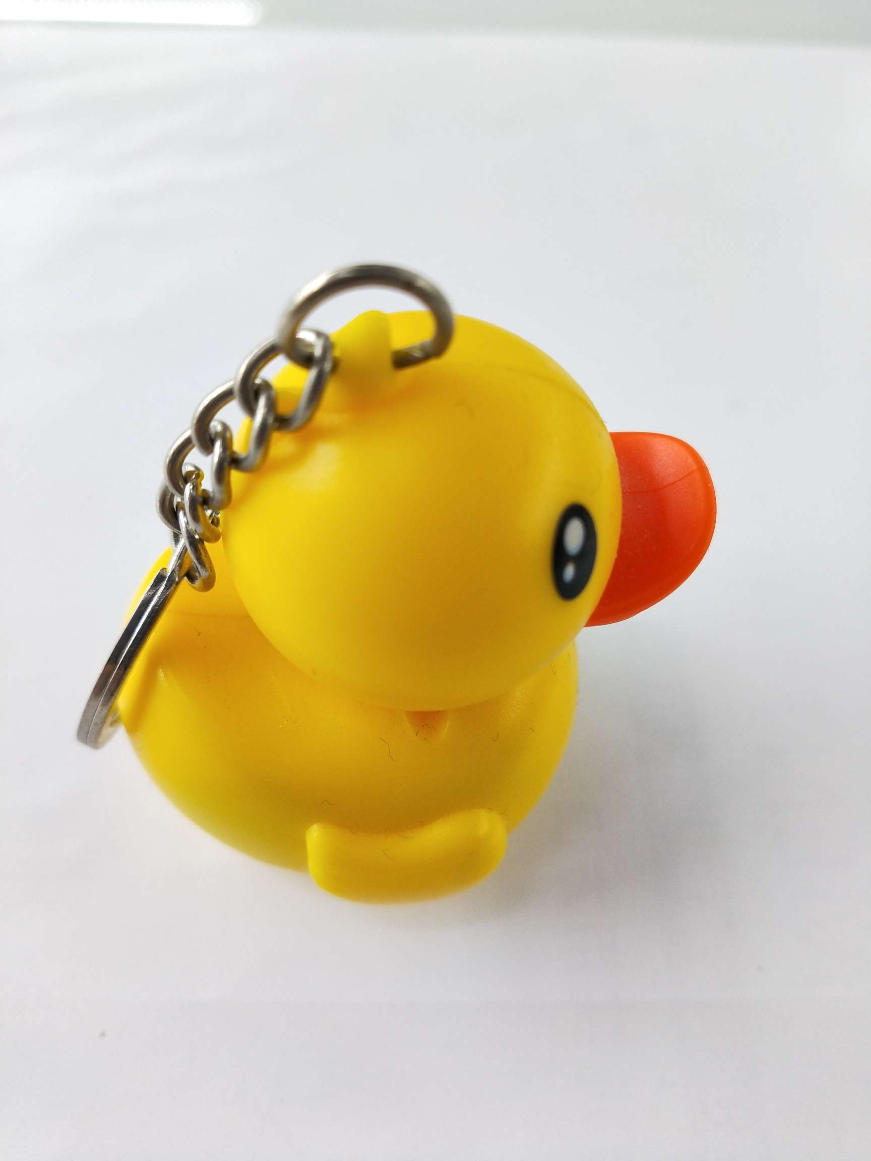 Wholesale of Jianqing Electronic LED Duck Light-emitting and sound-making keychains, pendants and accessories 01 details Picture