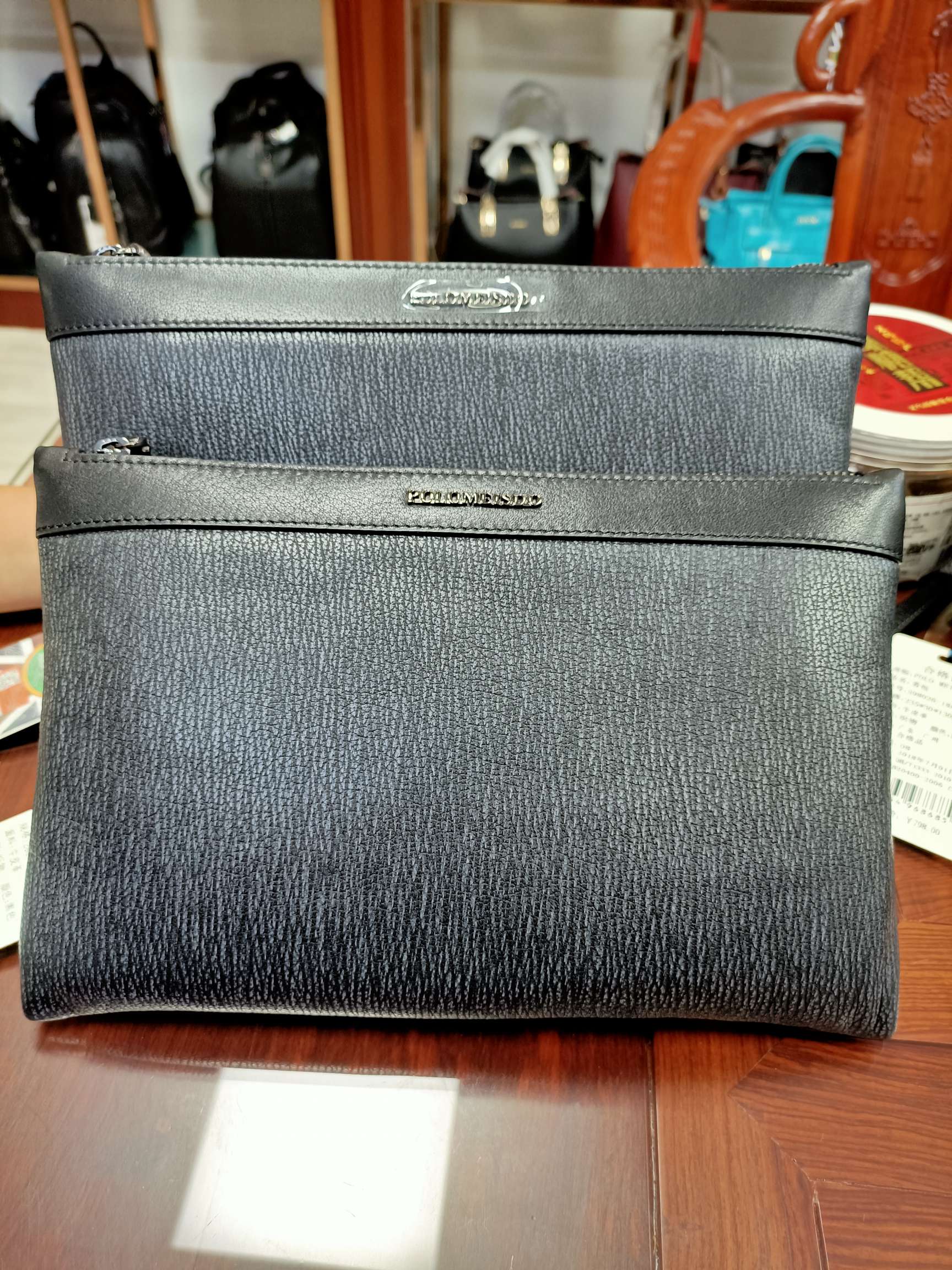 英国保罗男士真皮时尚手包