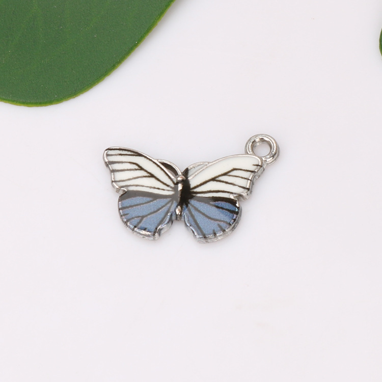 Cross-border best-selling European and American fashion accessories, alloy oil-dripping colored butterfly accessories, single-hanging accessories Item Picture