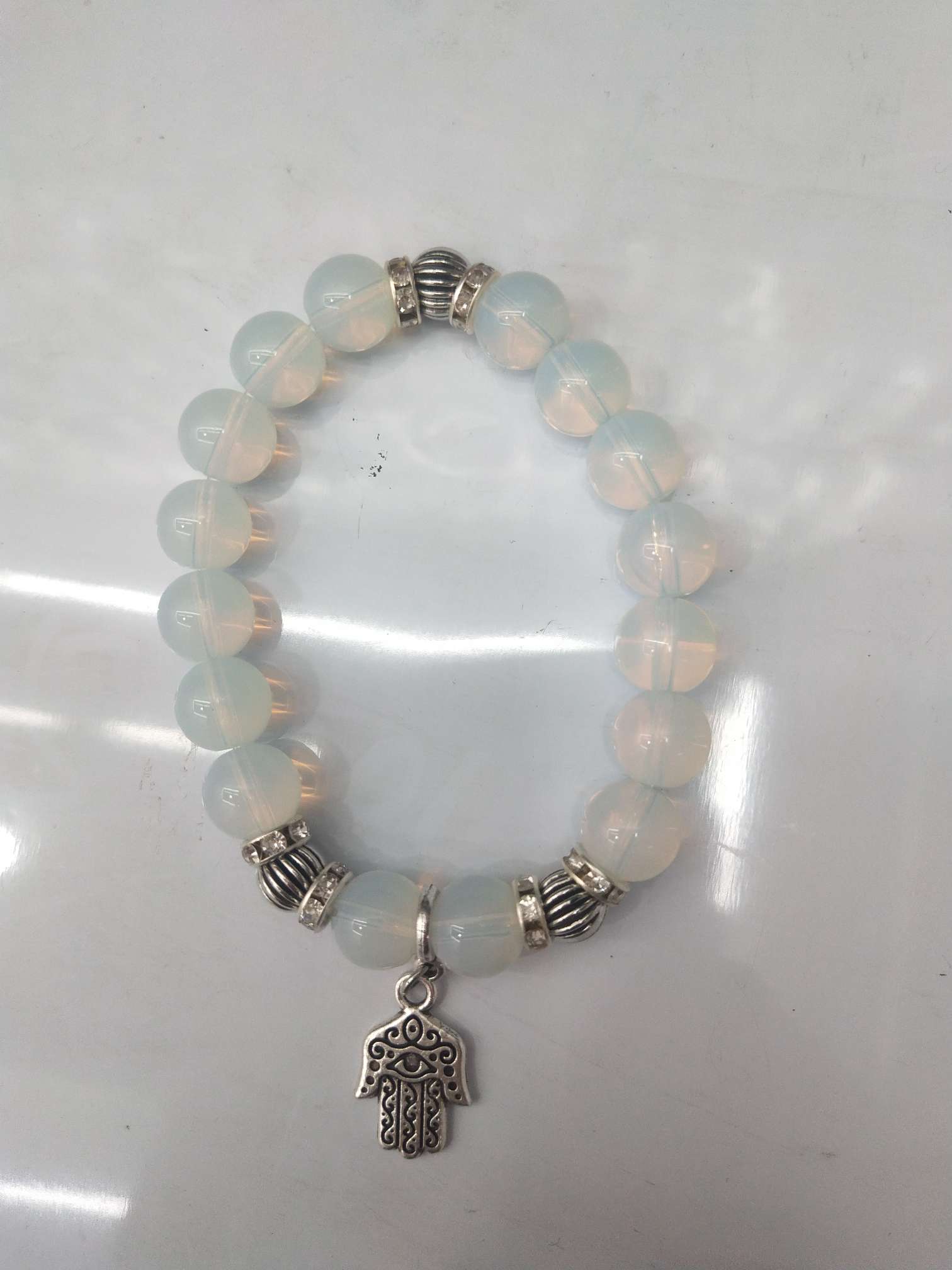 White beads hanging alloy palm ring thumbnail
