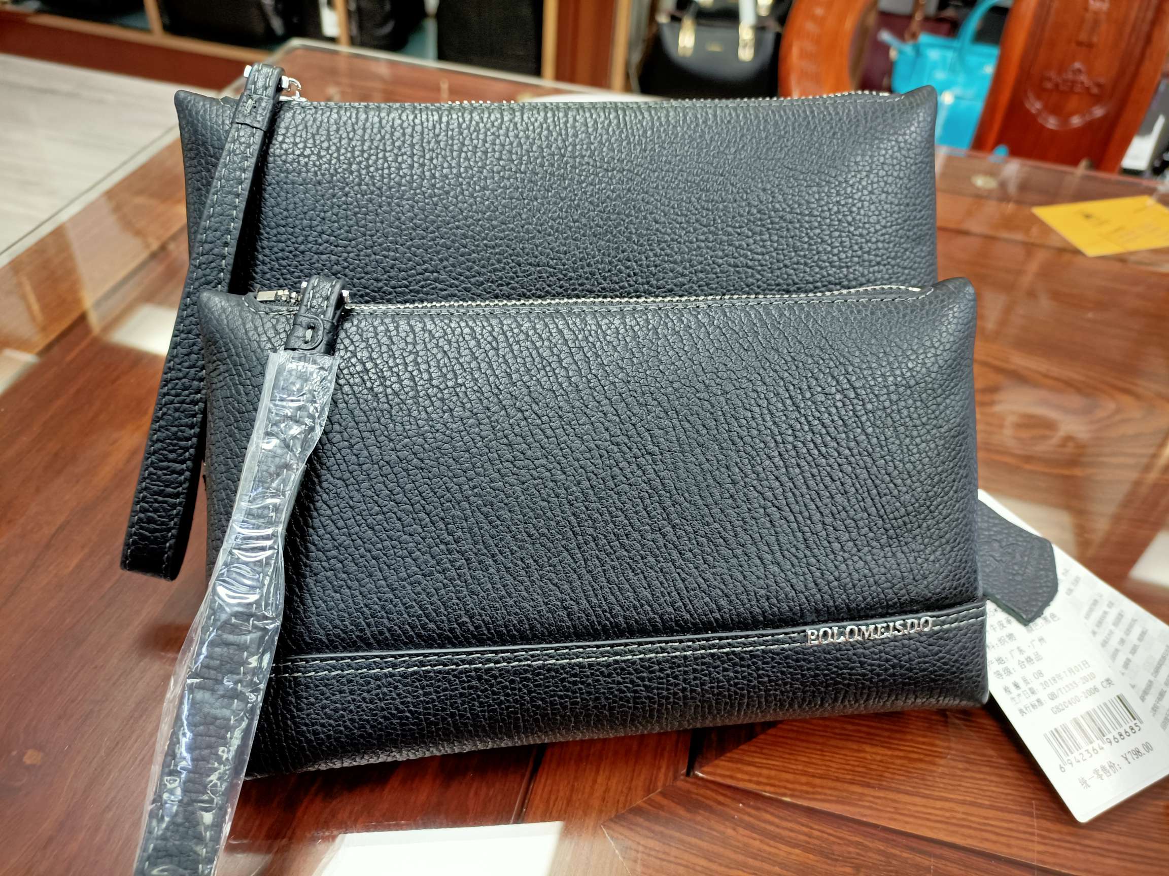 英国保罗真皮男士手包  手拿包