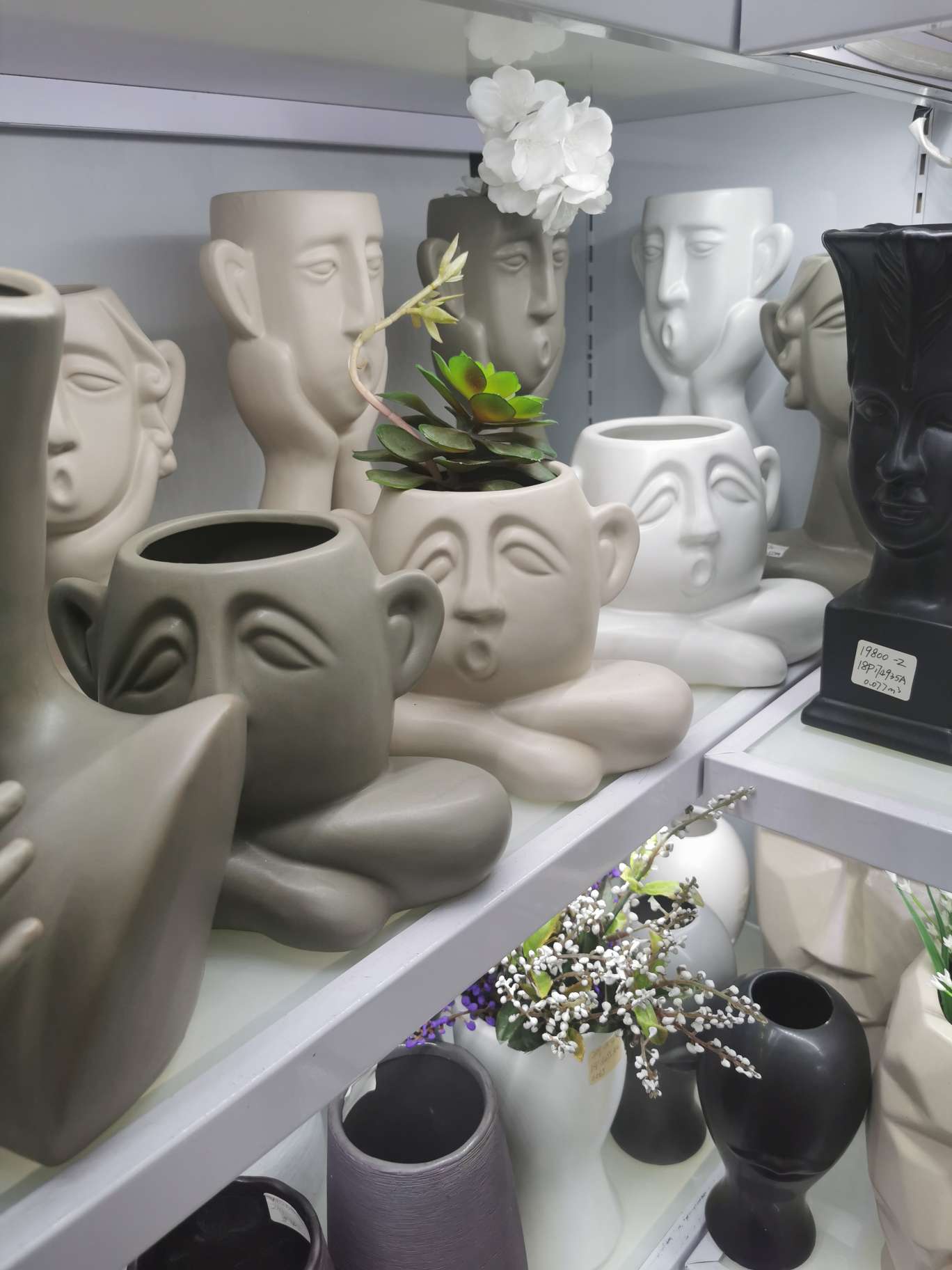 Both wholesale and retail of face-shaped vase handicrafts and decorative items are available. 1 details Picture