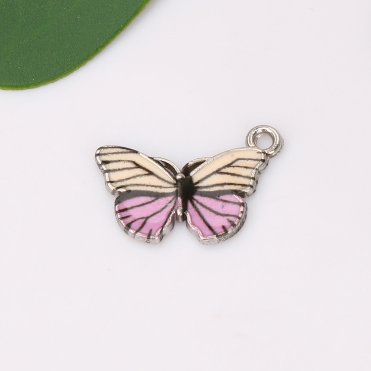 Cross-border best-selling European and American fashion accessories, alloy oil-dripping colored butterfly accessories, single-hanging accessories details Picture
