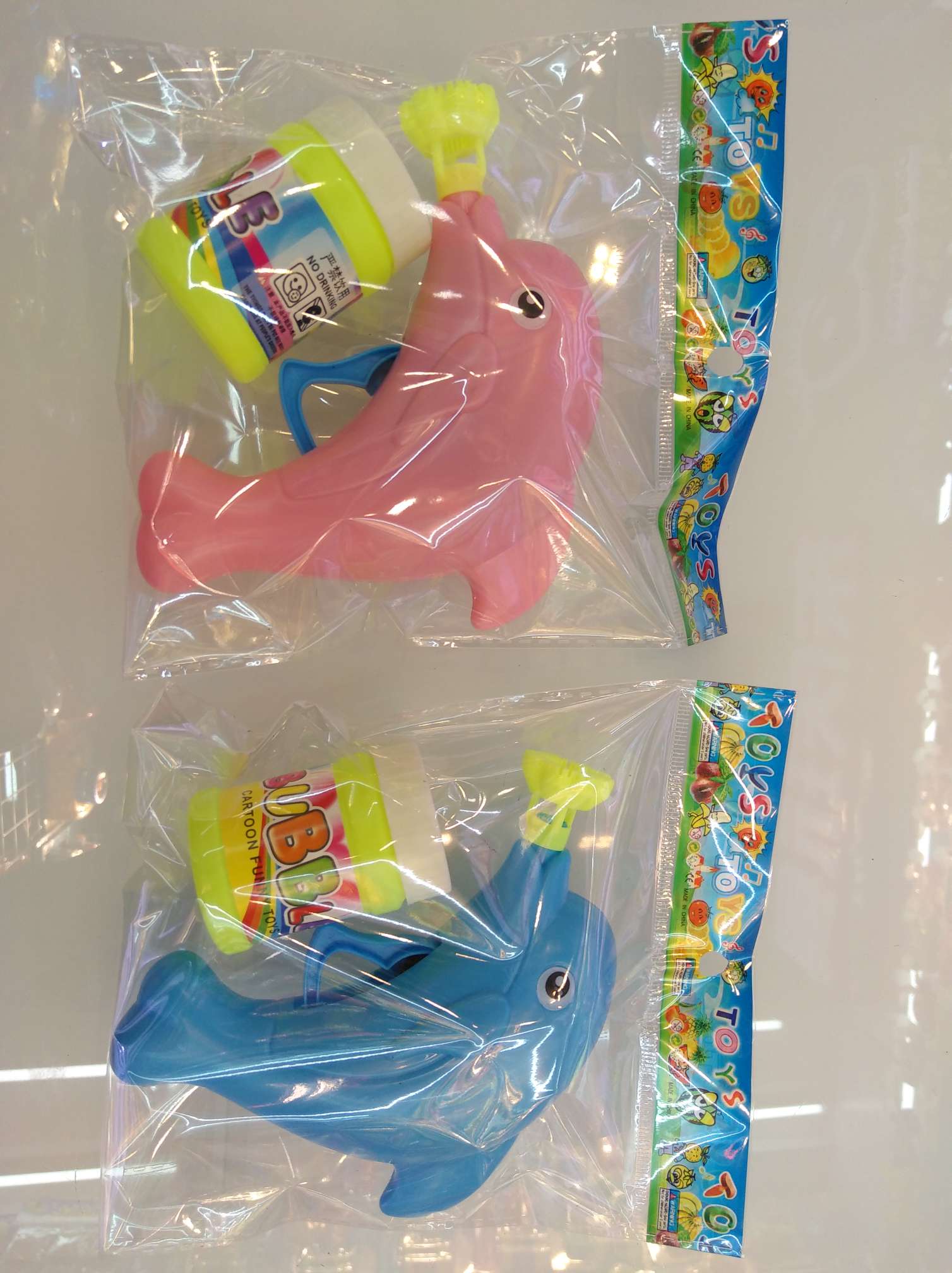Solid color dolphin bubble gun thumbnail