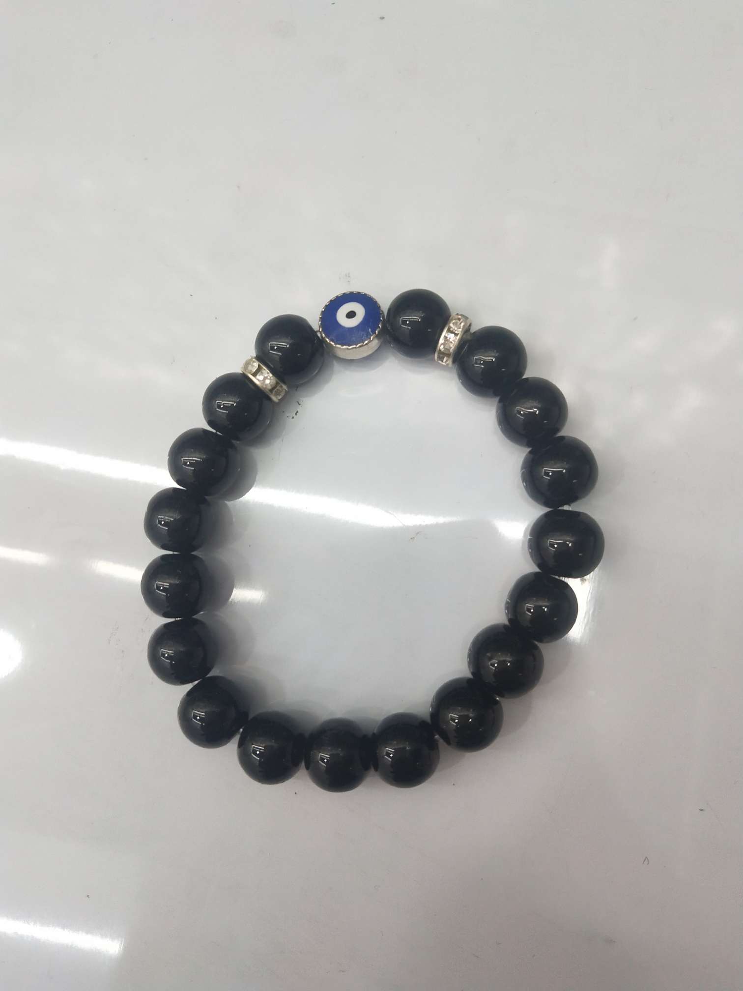 Double-faced eyes black bead hand ring thumbnail
