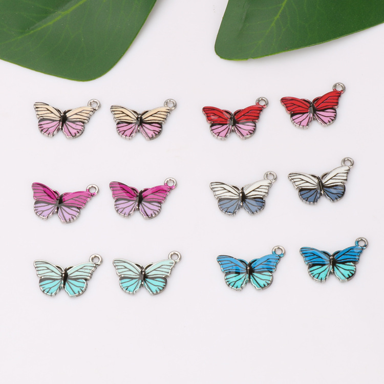 Cross-border best-selling European and American fashion accessories, alloy oil-dripping colored butterfly accessories, single-hanging accessories