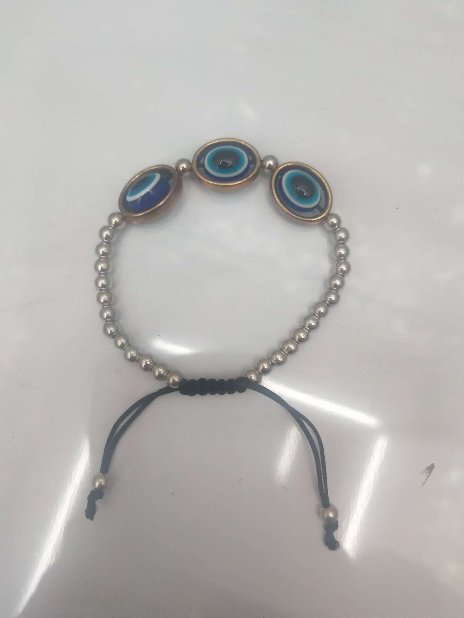 Bead three circles three eyes hand circles thumbnail