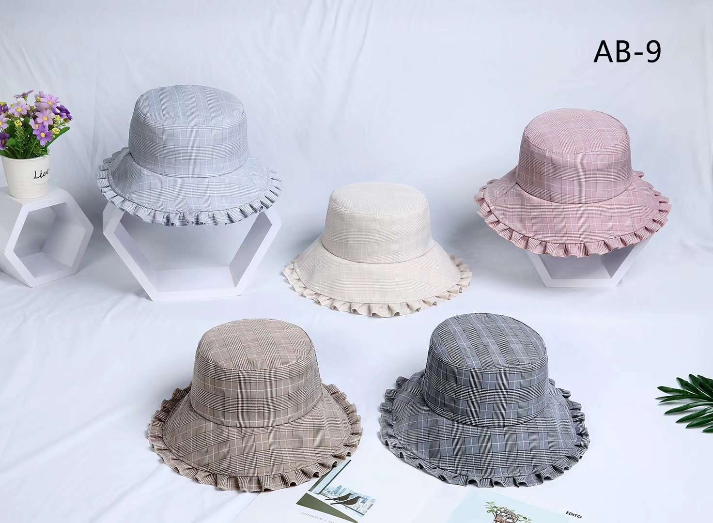A fisherman's hat with checkered edges details Picture