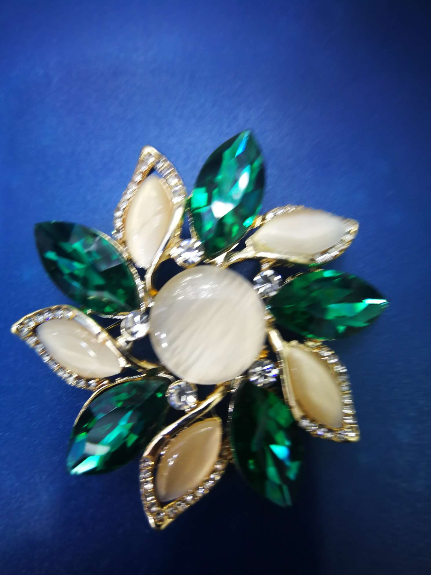 Opal glass rhinestone brooch