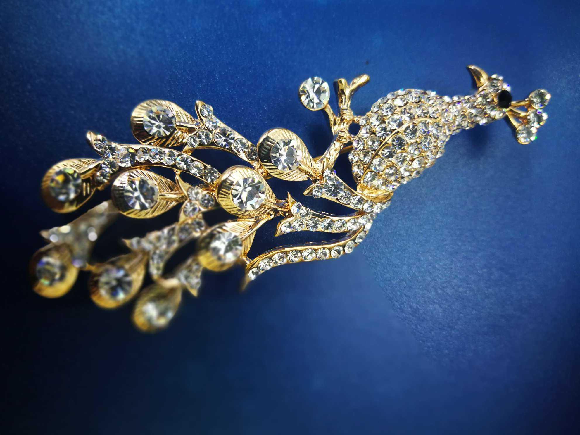 Peacock rhinestone brooch