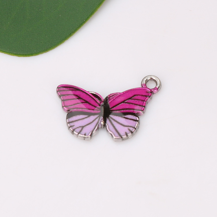 Cross-border best-selling European and American fashion accessories, alloy oil-dripping colored butterfly accessories, single-hanging accessories undefined