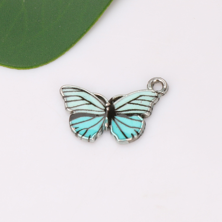 Cross-border best-selling European and American fashion accessories, alloy oil-dripping colored butterfly accessories, single-hanging accessories Application Scenario