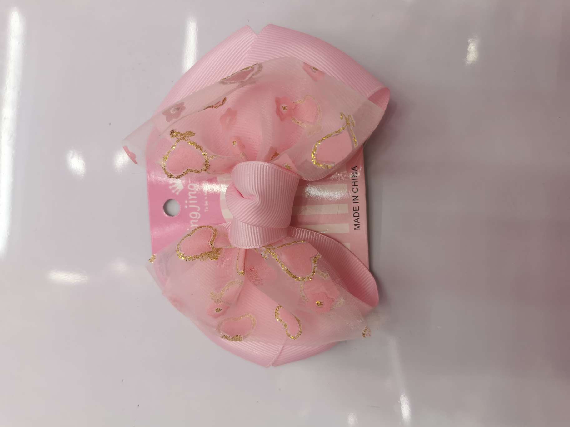 Gold powder heart-shaped bow tie big duck clip Specification image