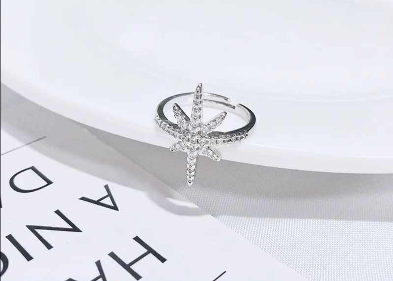 European and American luxury brand micro-inlaid zircon cross-shaped star ring index finger ring, personalized and versatile, factory direct sales undefined