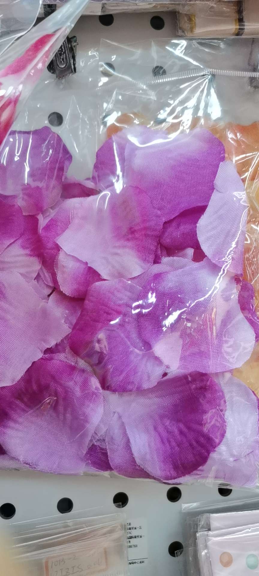 Artificial rose petals for wedding decoration in purple
