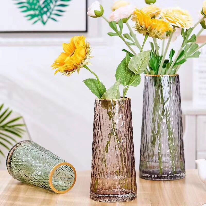 A golden-edged bark flower vase