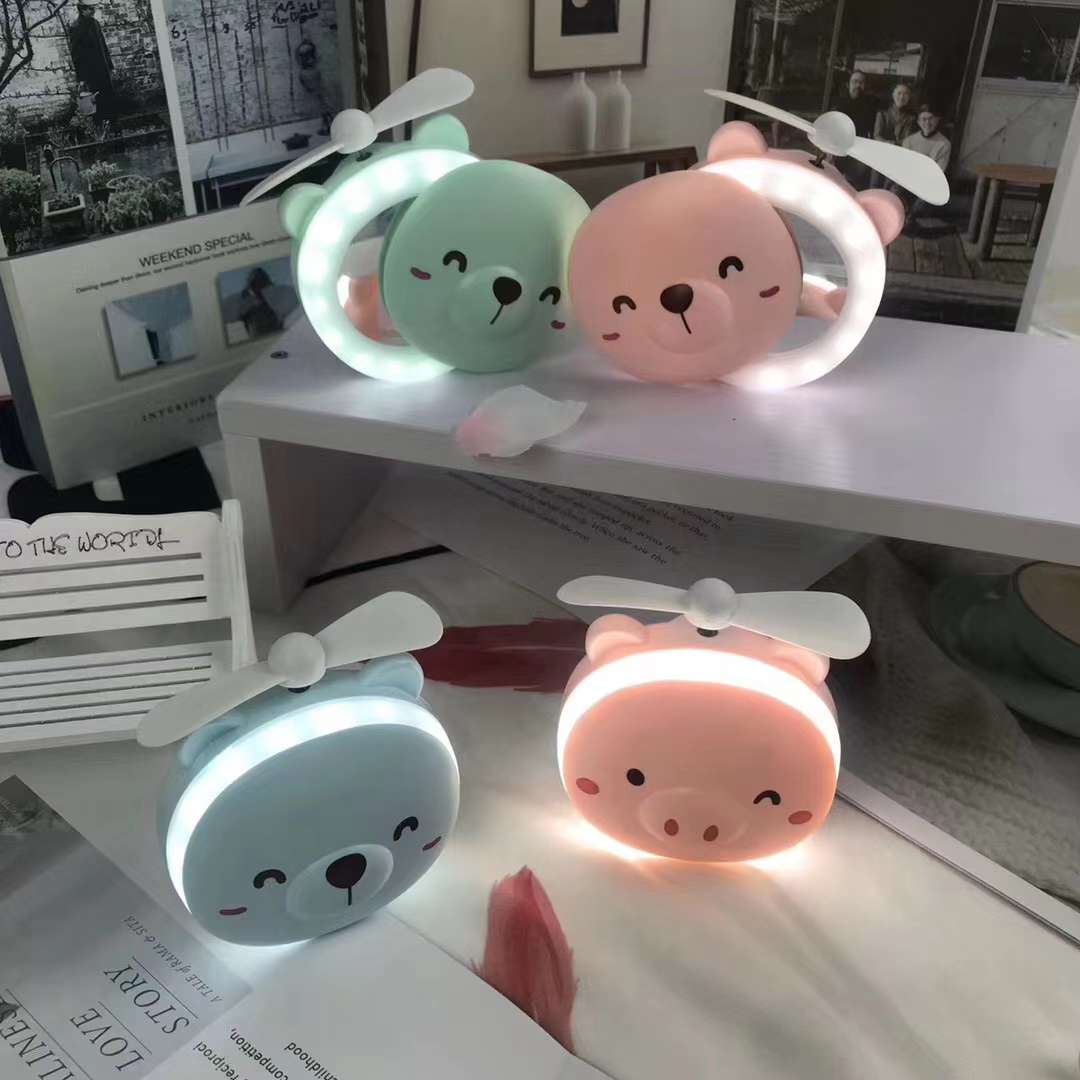 A novel and creative toy featuring a small fan for a popular beauty mirror undefined