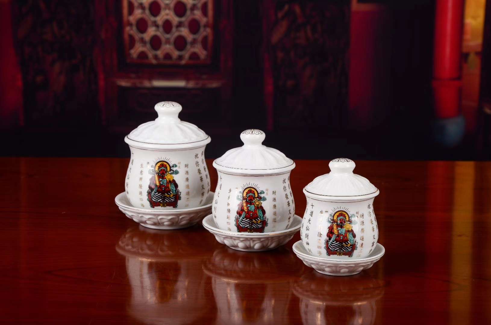 Auspicious Buddhist utensils: small, medium and large Wealth God cups