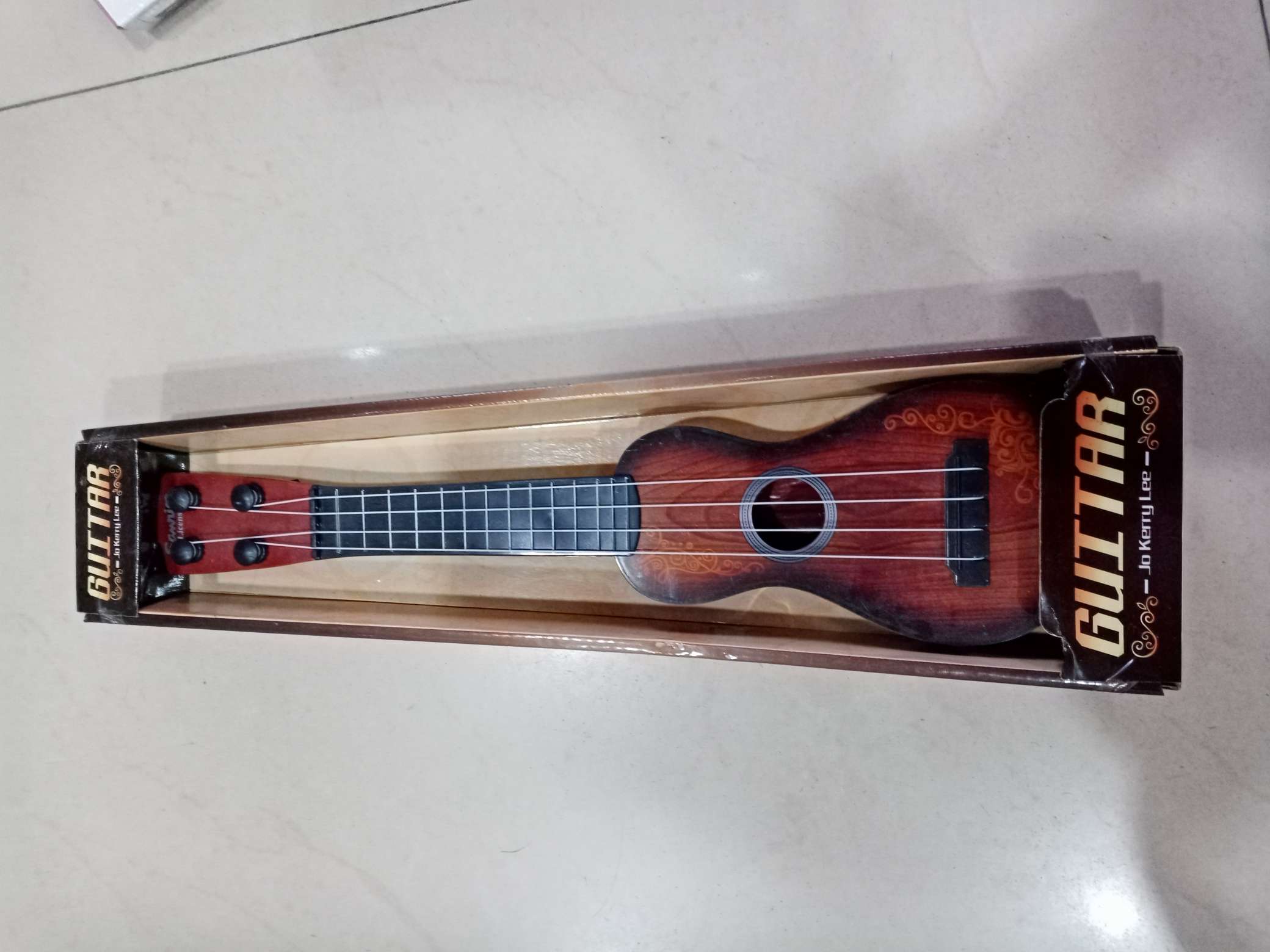 Toy guitar thumbnail